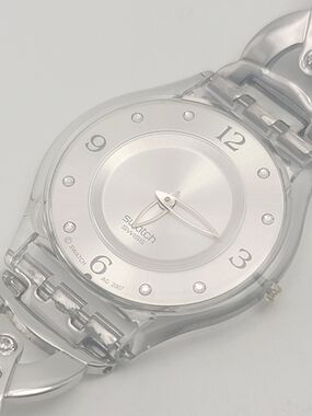 Swatch Skin Entangled Shine SFK310G Silver Rhinestone Bracelet Swiss Quartz